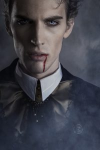 Portrait of a vampire. Halloween theme.